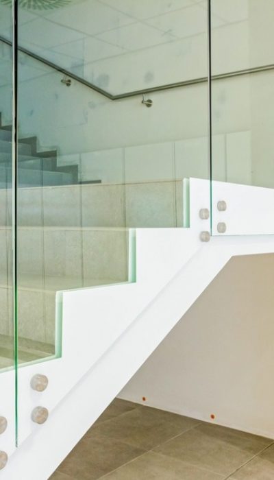 Interior glass railing on a staircase